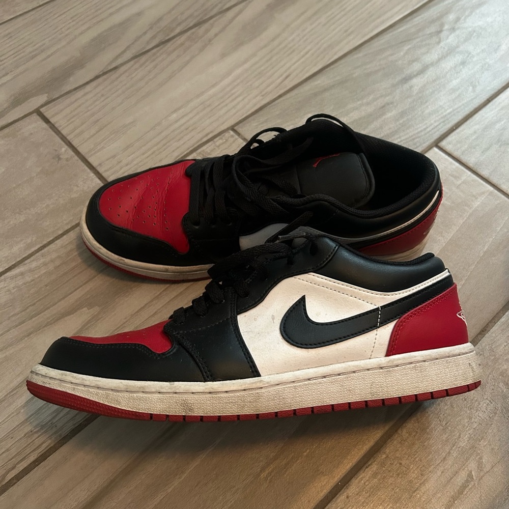 Nike Jordan 1 Black, Red, and White Low-Top Sneakers